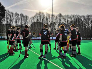 Hockey players in the sun
