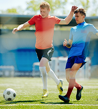 Footballers during play
