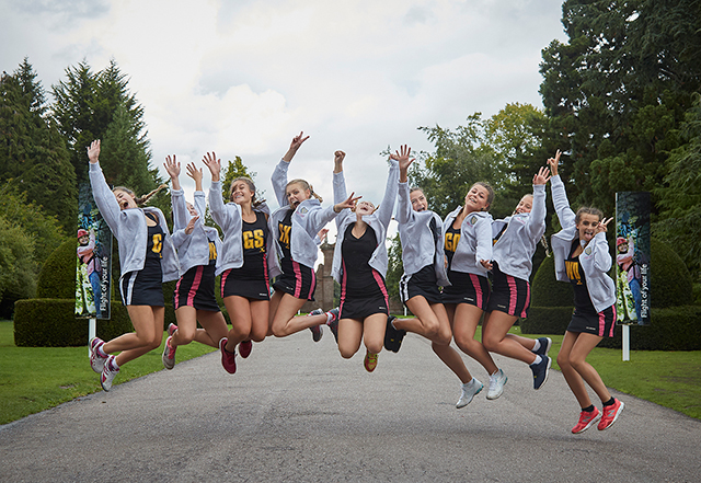 Netball players jumping in the air