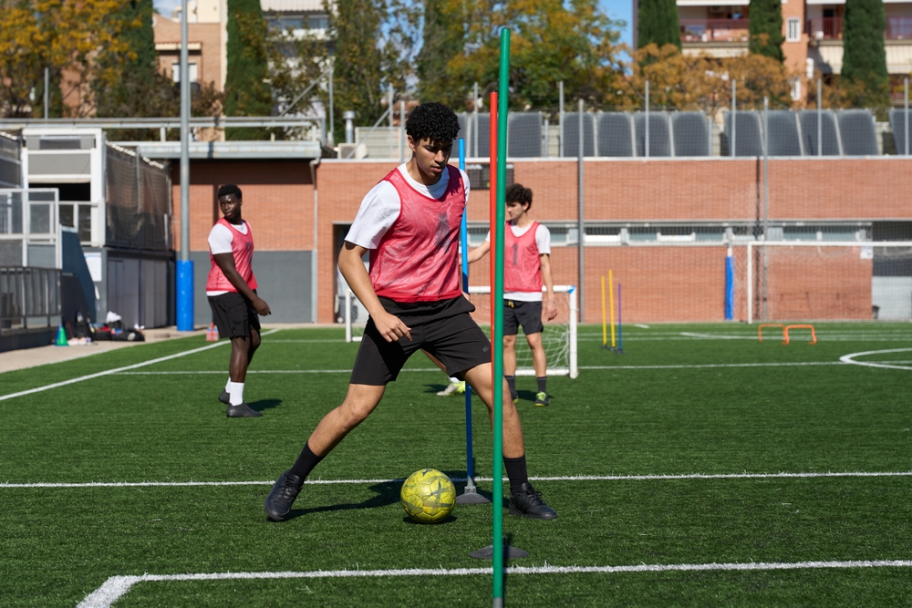 Young football players training