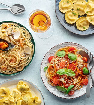 Pasta,Variety.,Italian,Food,And,Drinks,,Overhead,Flat,Lay,Shot. A selection of delicious Italian dishes