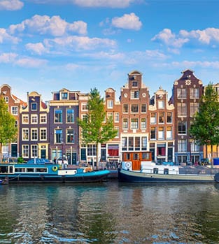 Amsterdam.,Panoramic,View,Of,The,Historic,City,Center,Of,Amsterdam. The iconic canal and traditional houses in Amsterdam