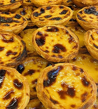 313x349_portugal-lisbon-pasteis-de-nata-credit-carole-lagrave Delicious Pasteis de Nata pastries from Belem, Lisbon