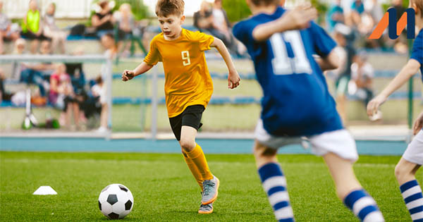Boys playing football