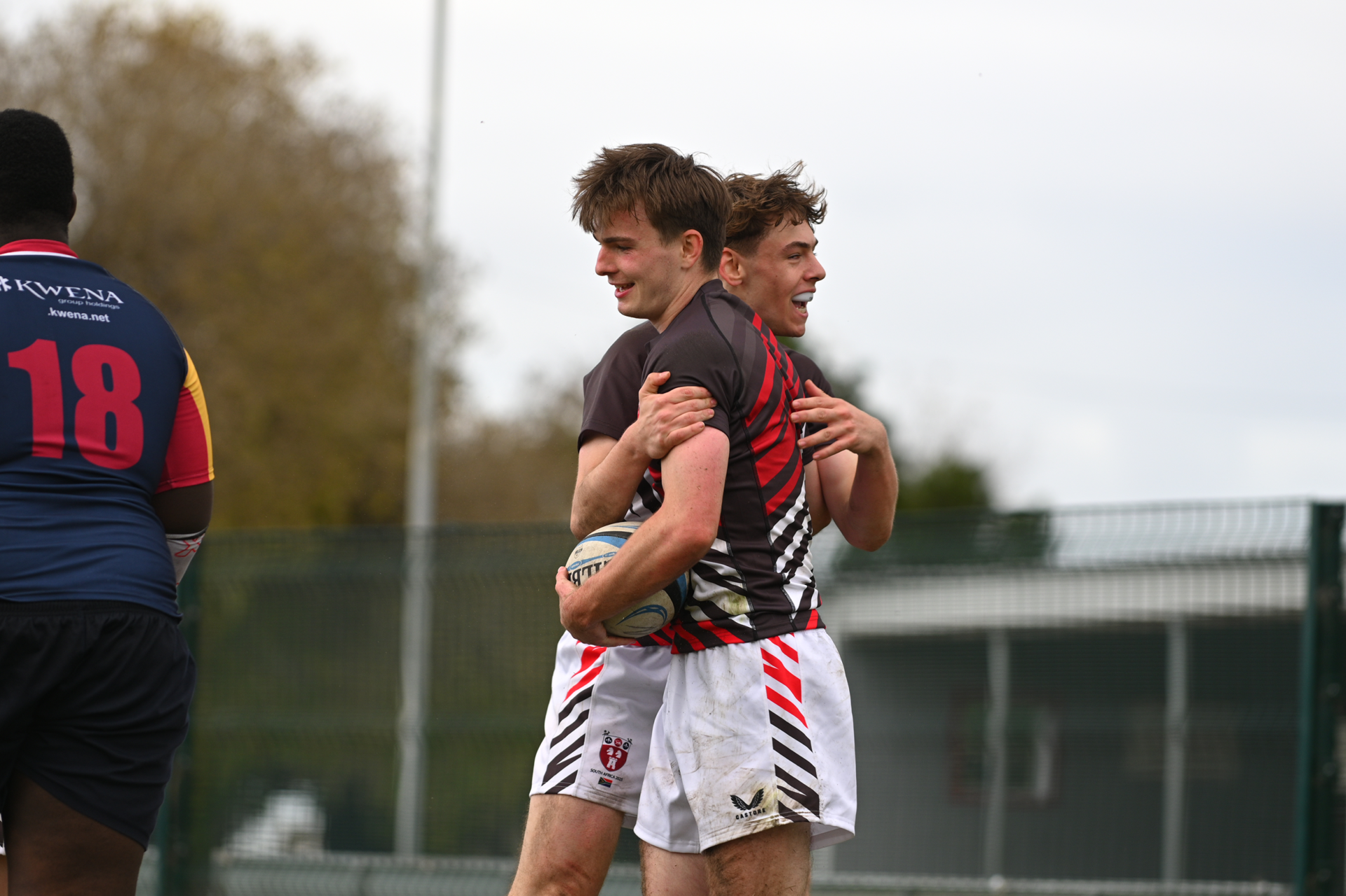 Two rugby players during a match