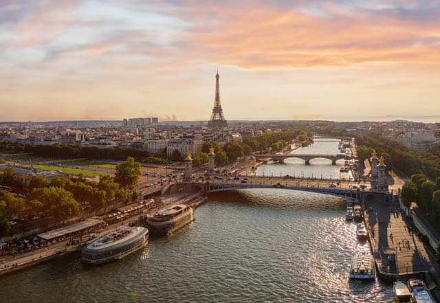 Aerial view of Paris, with the Eiffel Tower and River Seine at sunset