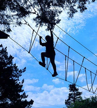 High ropes against a blue sky
