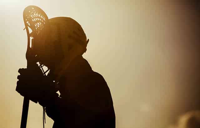 Lacrosse player in the sun
