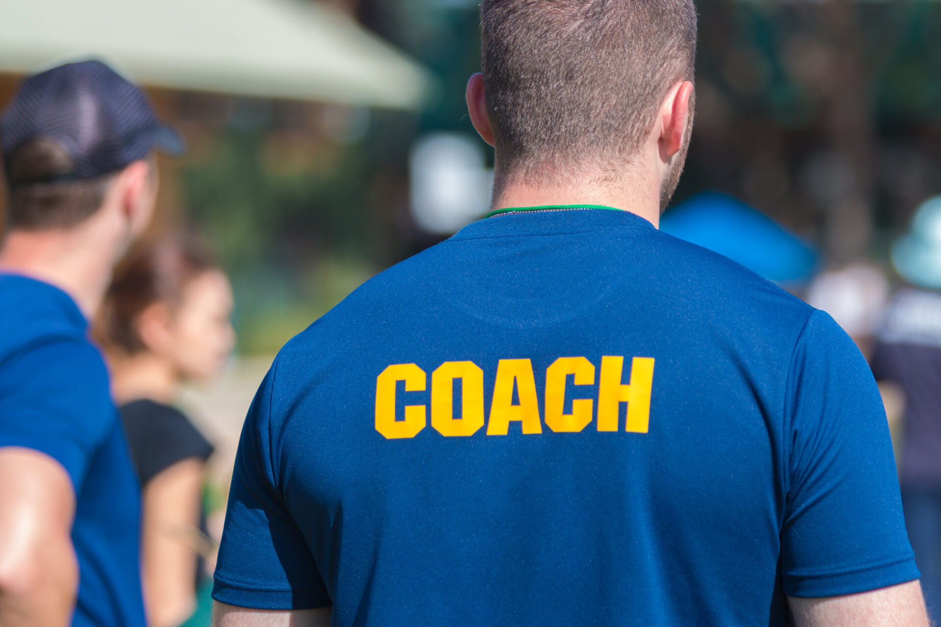 Training coach in a blue shirt