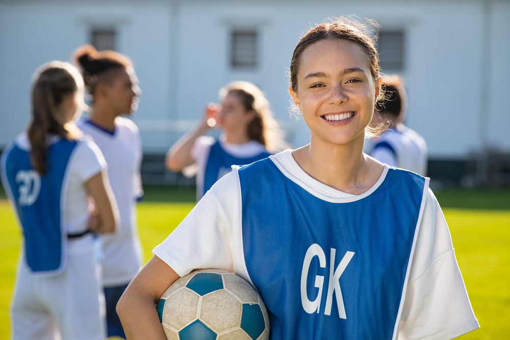 Smiling football girl