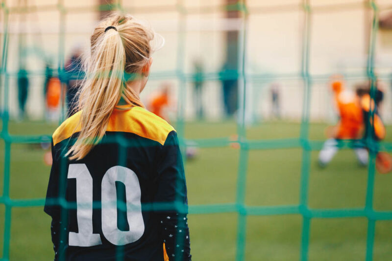 Football girl goal keeper wearing n.10 jersey