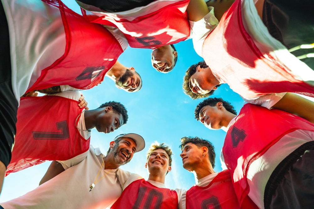 Football team in a huddle