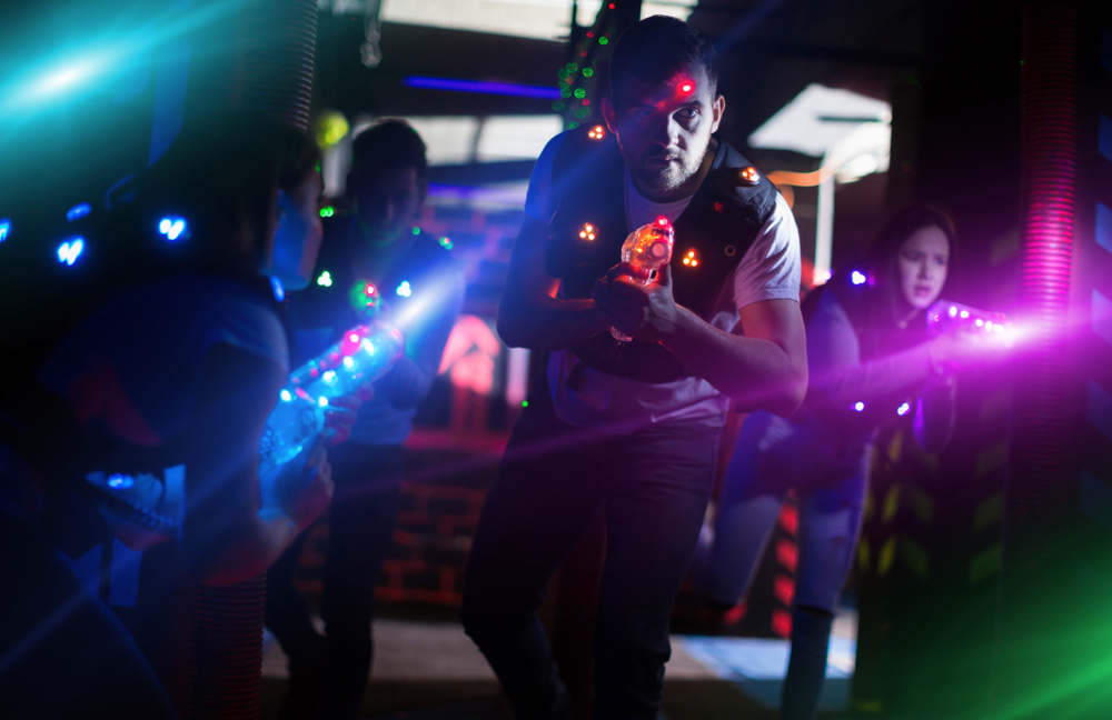 Students playing laser tag in the dark