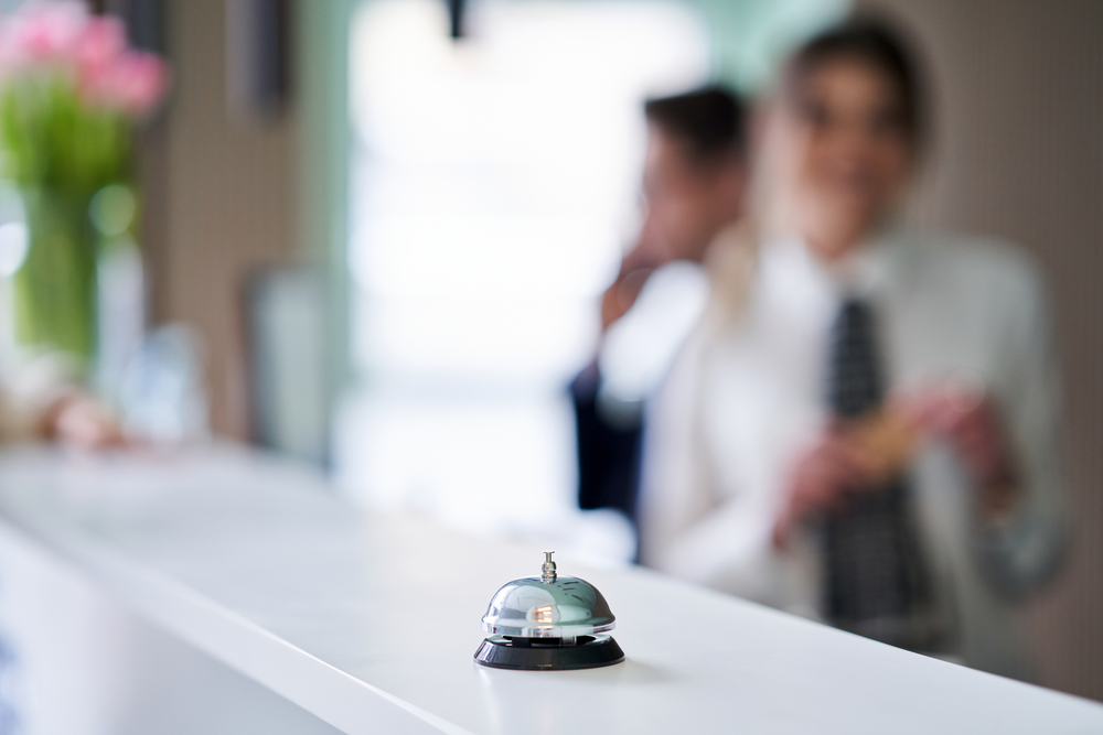 Hotel bell at reception desk