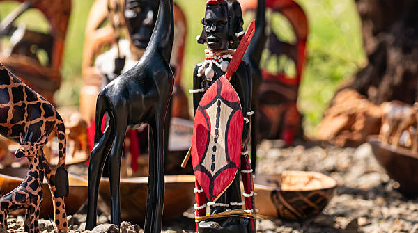 Traditional wooden Kenyan statuettes in a souvenir stand