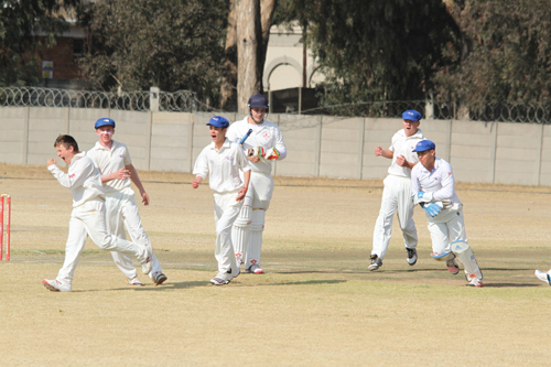 Players at a game of cricket in Namibia