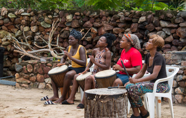 African women playing bongo drums in Namibia