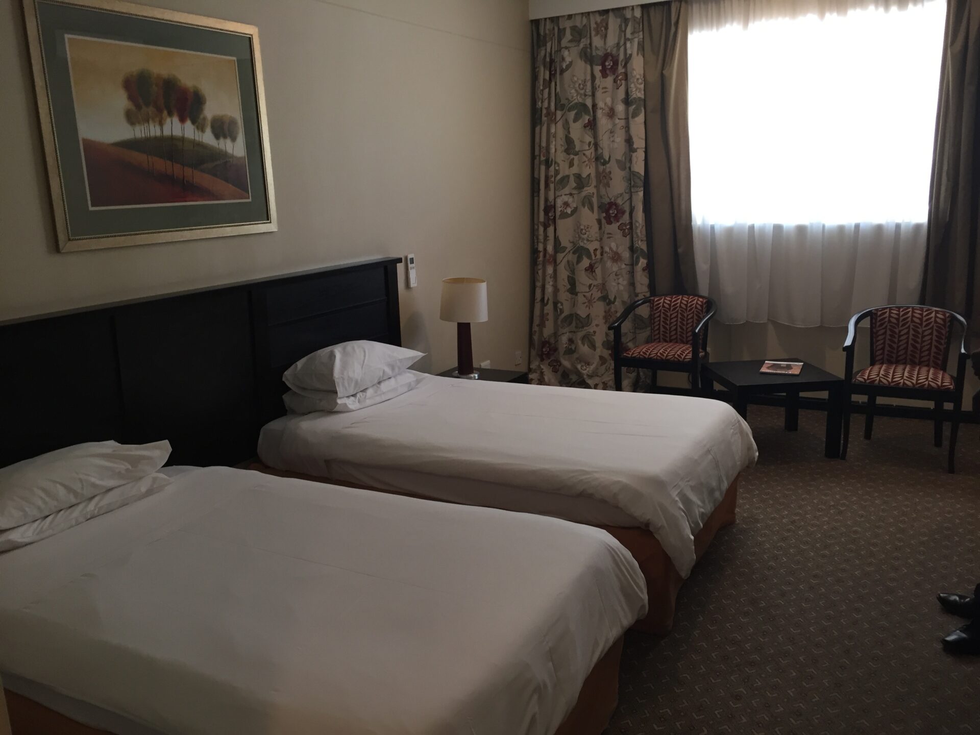 Bedroom at Safari Court Hotel